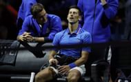 Roger Federer (L) and Novak Djokovic (seated) at the Laver Cup 2022 Day 3 - Source: Getty